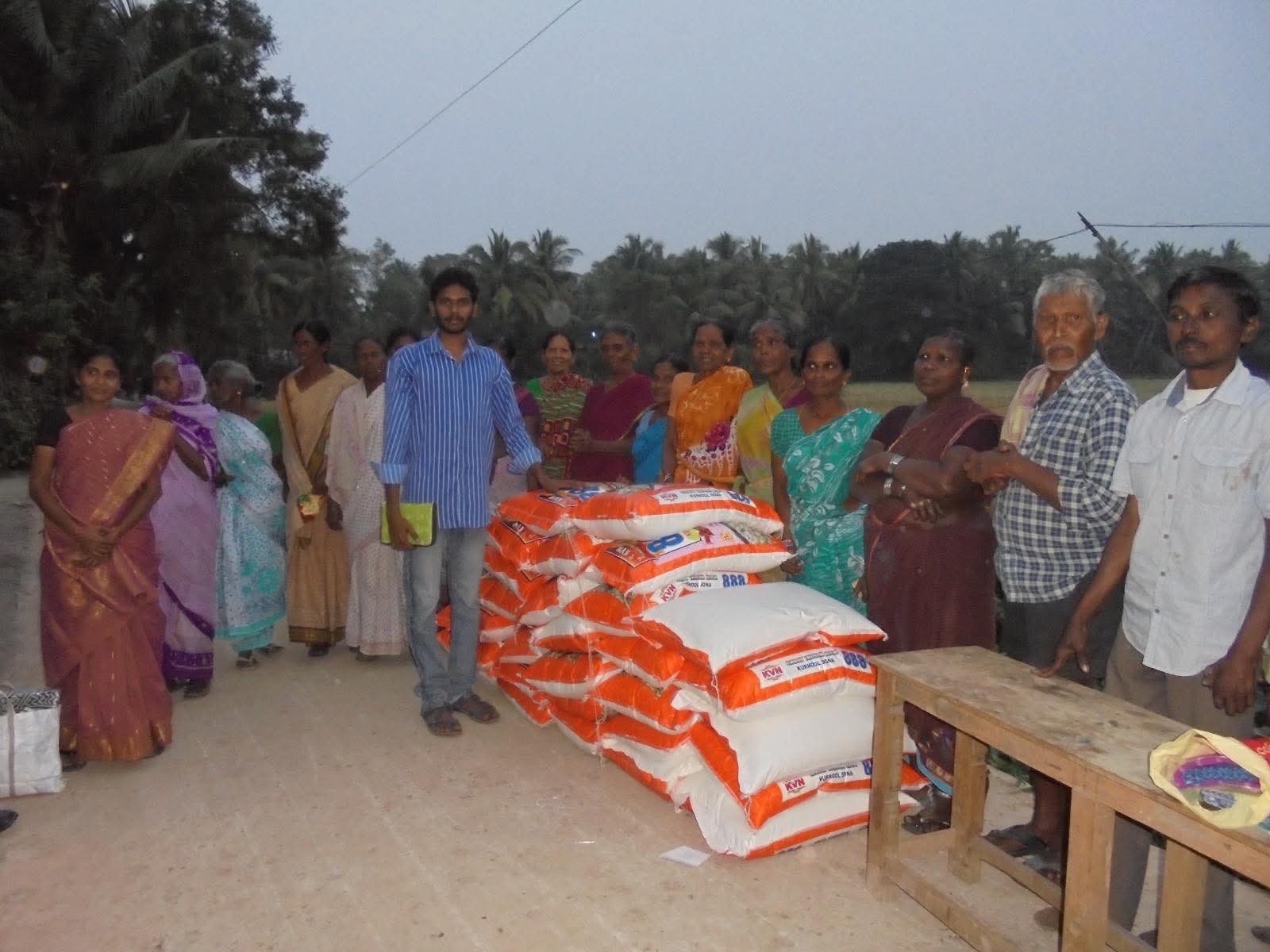 Distribution of rice and food material to poor families